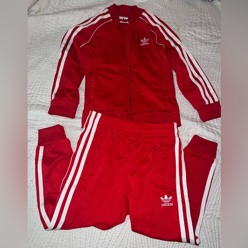 Adidas track suit size 4/5 red